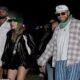 Fans SLAMMED Travis Kelce and Taylor Swift for their 'RIDICULOUS' choice of dressing as they were both seen looking loved-up they holds hands together after partying the night away at Coachella - 'Taylor and Travis both look ridiculous. She's trying to dress all edgy and Travis looks like a clown...'