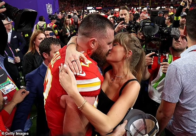 EXCLUSIVE: Travis Kelce opens up on life with Taylor Swift in rare moment on New Heights podcast... as he reveals he is 'having a blast' and 'doesn't know' how he got pop superstar into the NFL: 'She wasn't into sports'