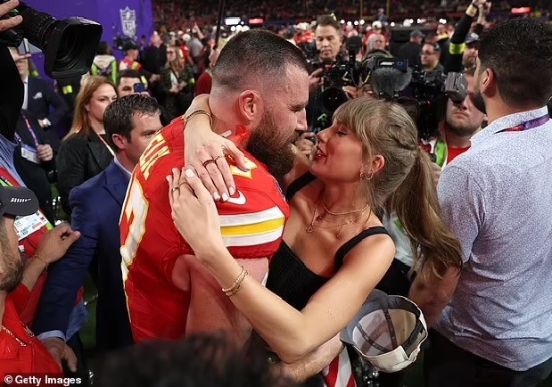 Travis Kelce 'the perfect host' for 'Are You Smarter Than a Celebrity' as an insider reveals Taylor Swift's boyfriend and Super Bowl winner has made a brilliant first impression during filming