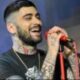 Zayn Malik's killer smile before stepping on stage drives fans wild