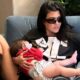 Kourtney Kardashian Shares Sweet Armchair Cuddle with Son Rocky in Cute New Photo