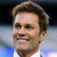 Breaking News: Tom Brady blushes with his new trainer partner while fantasizing about working out together...see more